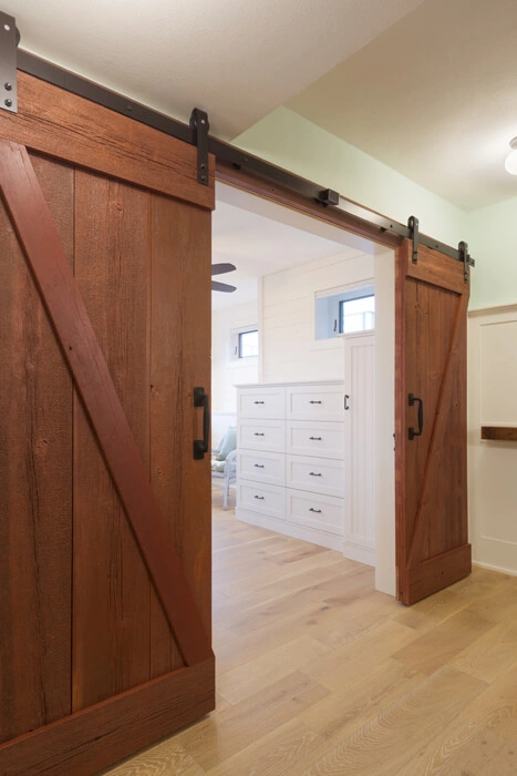 packers-themed-basement-16 - After – Sliding barn doors and built in drawers