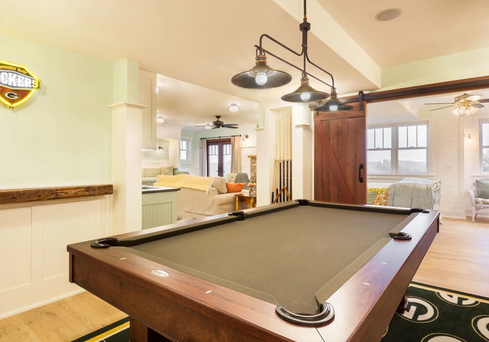 packers-themed-basement-6 - After – Barn board ledge and niche for pool cues