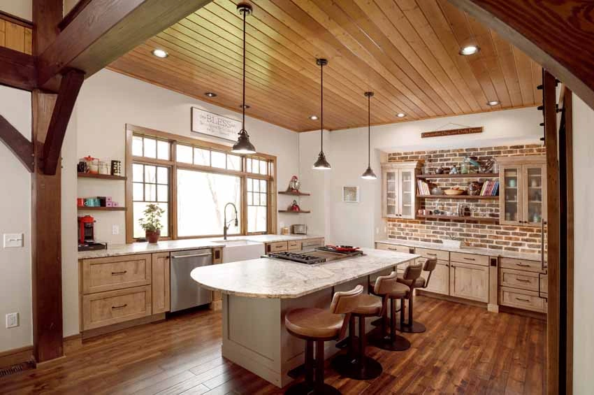 timberframe-home-wi14 - Kitchen with White Persia Suede Countertops and Two-Toned Painted Cabinetry