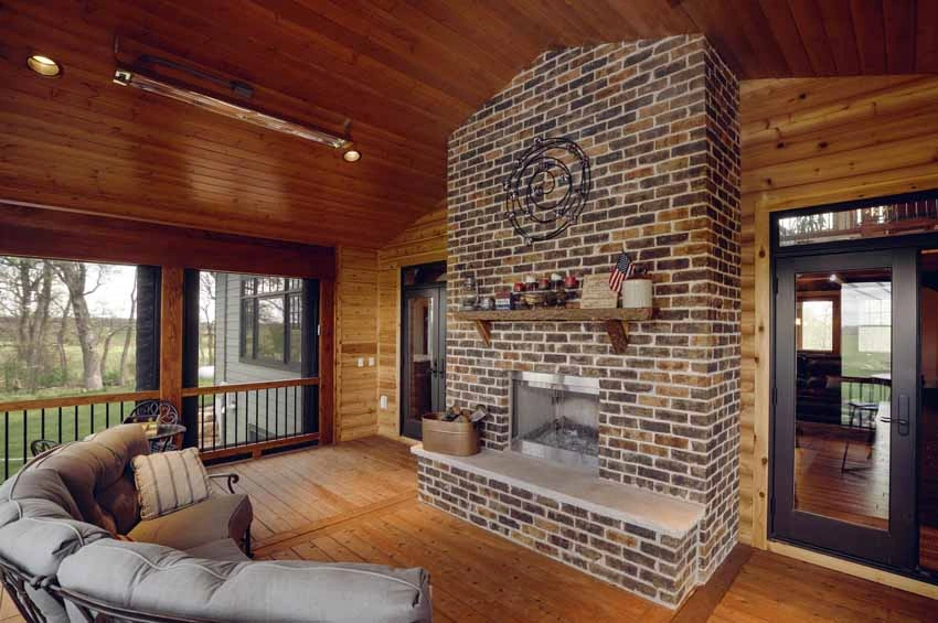 timberframe-home-wi3 - Screened-In Back Porch with a Fireplace