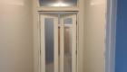 white glass doors with transom