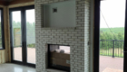 white brick exterior fireplace