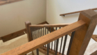 wood railing with wrought iron