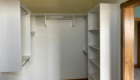 closet with white built in shelves