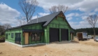 Barndominium with timber accents