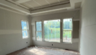 master bedroom with tray ceiling