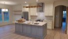 kitchen with grey and white cabinetry