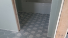 bathroom with tile flooring