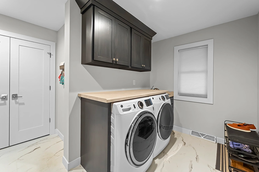 laundry-room-remodel - After – Functional laundry and larger closet