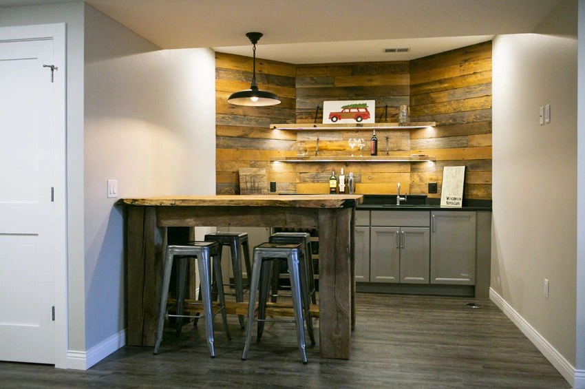Basement-After - After – Wet bar with barnboard accent wall