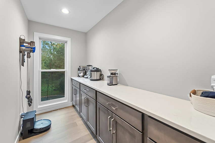 remodel-16 - After – Pantry with quartz countertop and cabinetry in Smoke finish