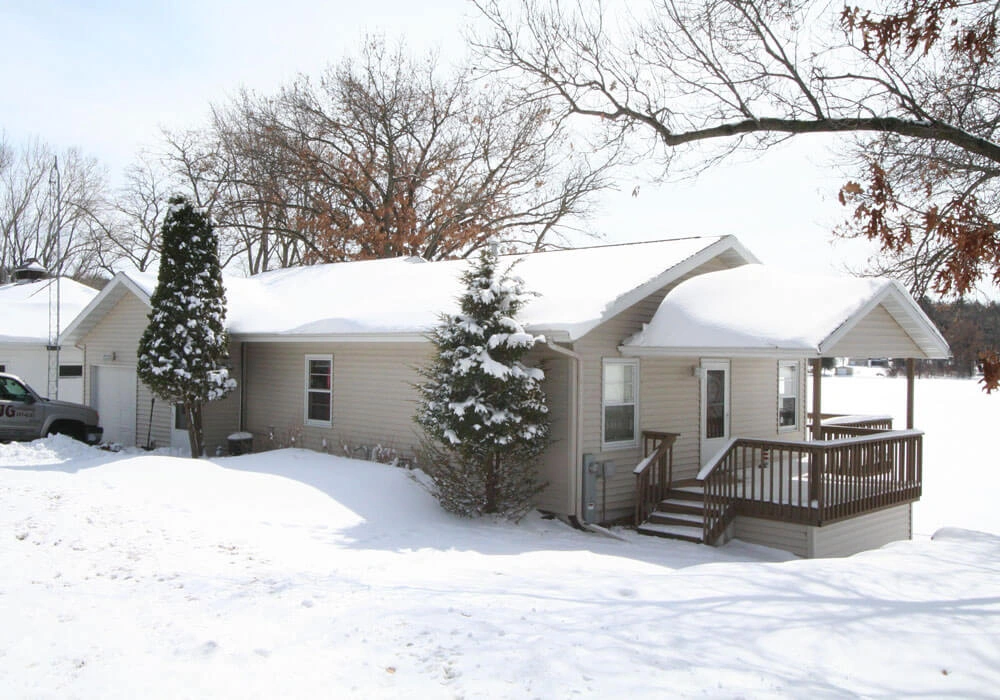 exterior-porch-remodel-wisconsin-before - Before – Plain, white siding