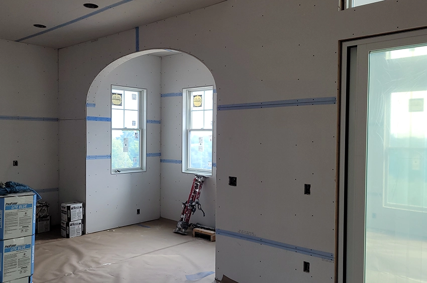 drywall and arched entry