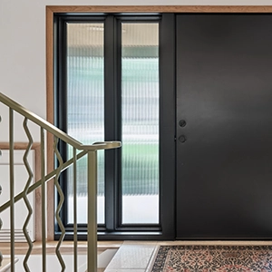 front entry with green railing